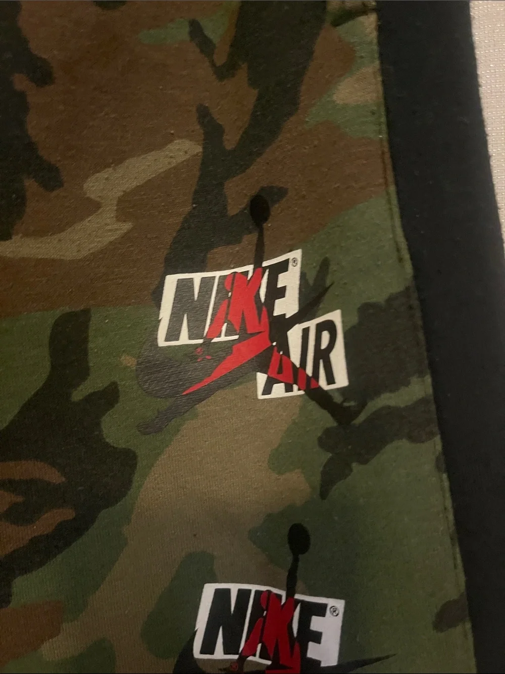 Nike Kids Camo Joggers with Black Side Panels and Red Drawstring